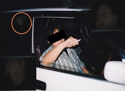 車を覗く何かを訴える子供の霊 - 心霊写真